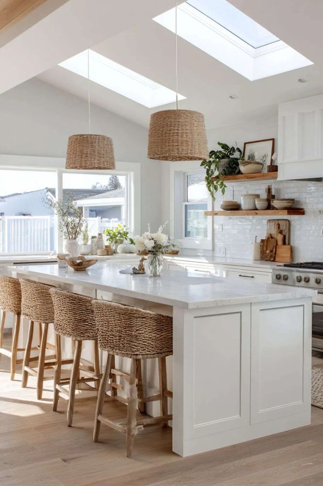 Classic kitchen featuring unlacquered brass cabinet pulls and a vintage-style faucet.