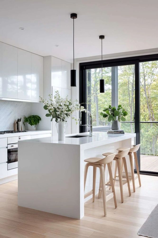 Kitchen featuring white upper cabinets with contrasting navy blue lower base cabinets.