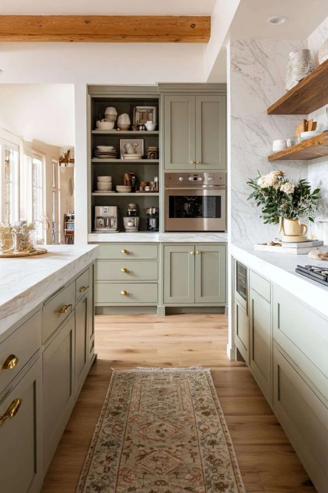 Kitchen island featuring two massive, sculptural pendant lights hanging above.