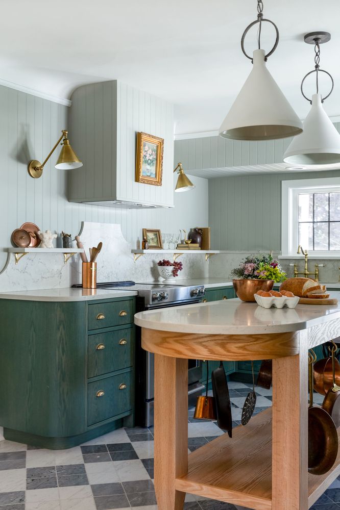 Kitchen featuring a bold retro-style mint green range and matching refrigerator.