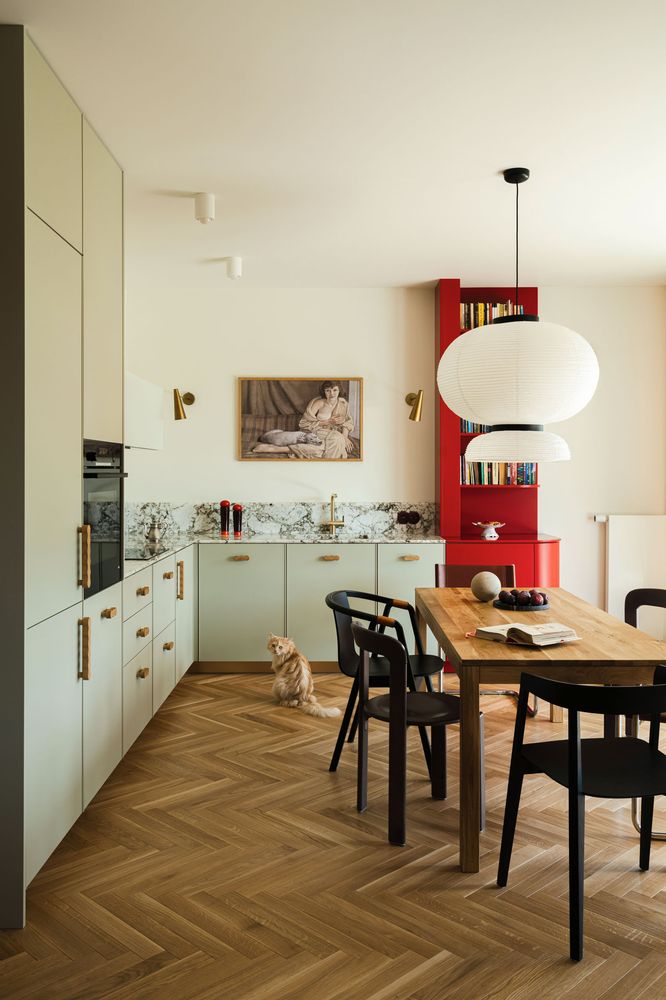 Kitchen featuring a massive floor-to-ceiling plaster and stone range hood.