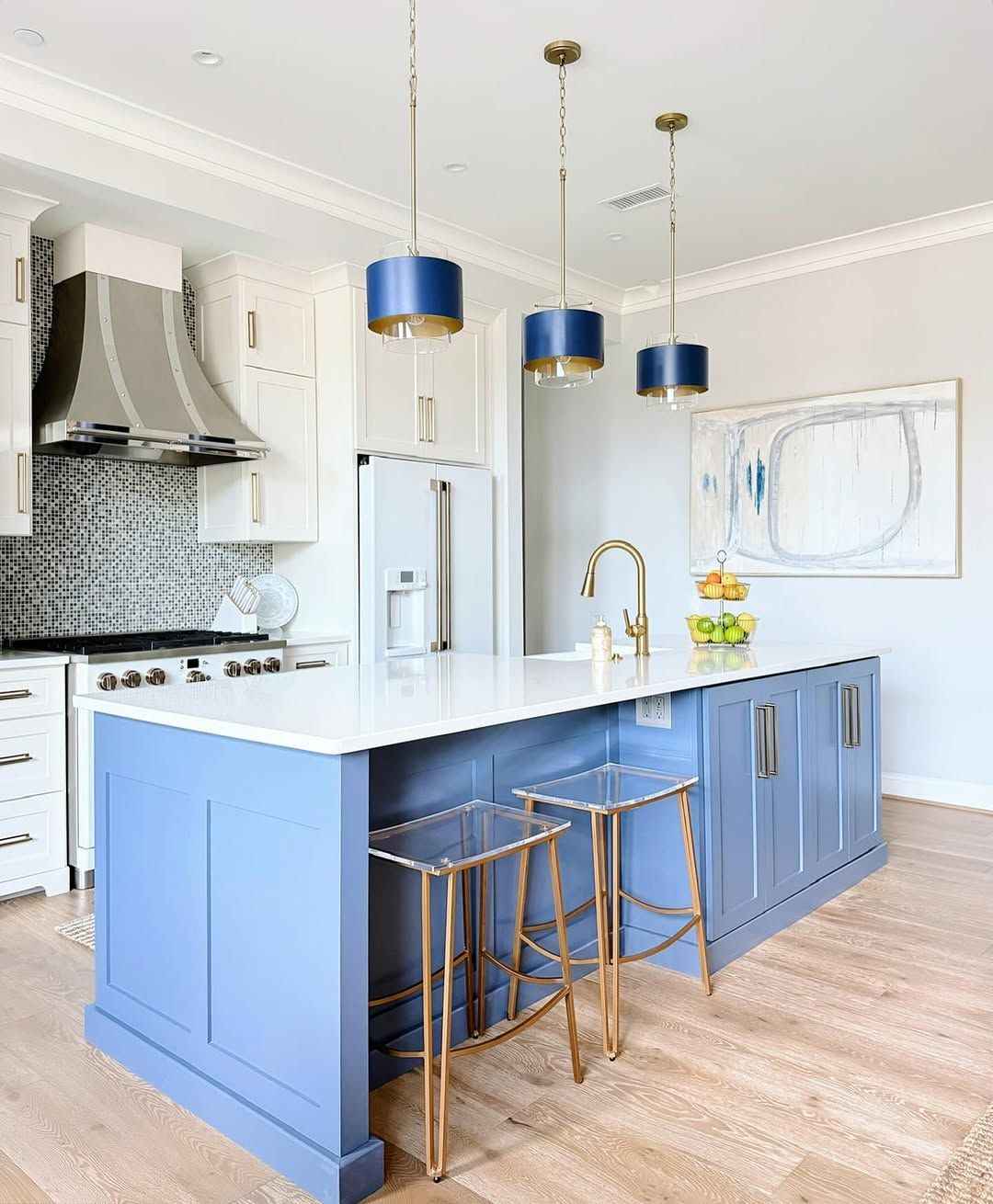 Rustic kitchen with a dark oak butcher block island, black metal accents, and woven rattan pendant lamps.