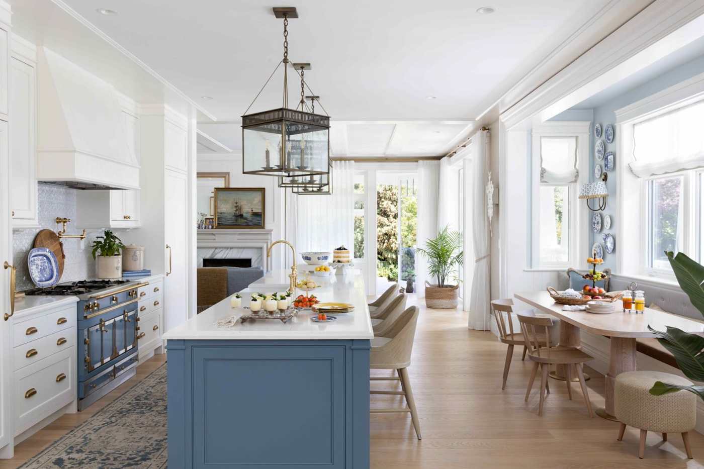 A kitchen island with a soft, curved silhouette and a rounded white countertop.