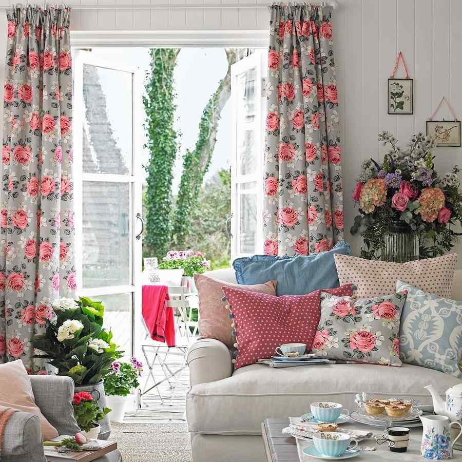 Modern living room with dip-dyed ombre curtains, neutral furniture, minimalist art, soft lighting.
