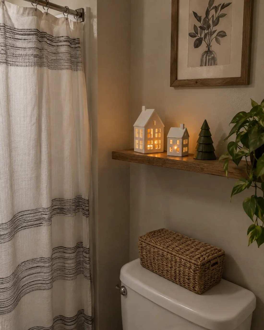 Tiny house models on shelf, white walls, warm fairy lights, magical holiday scene