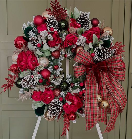 Mantel with personalized monogram stockings, copper hooks, soft amber lighting, pine garland.