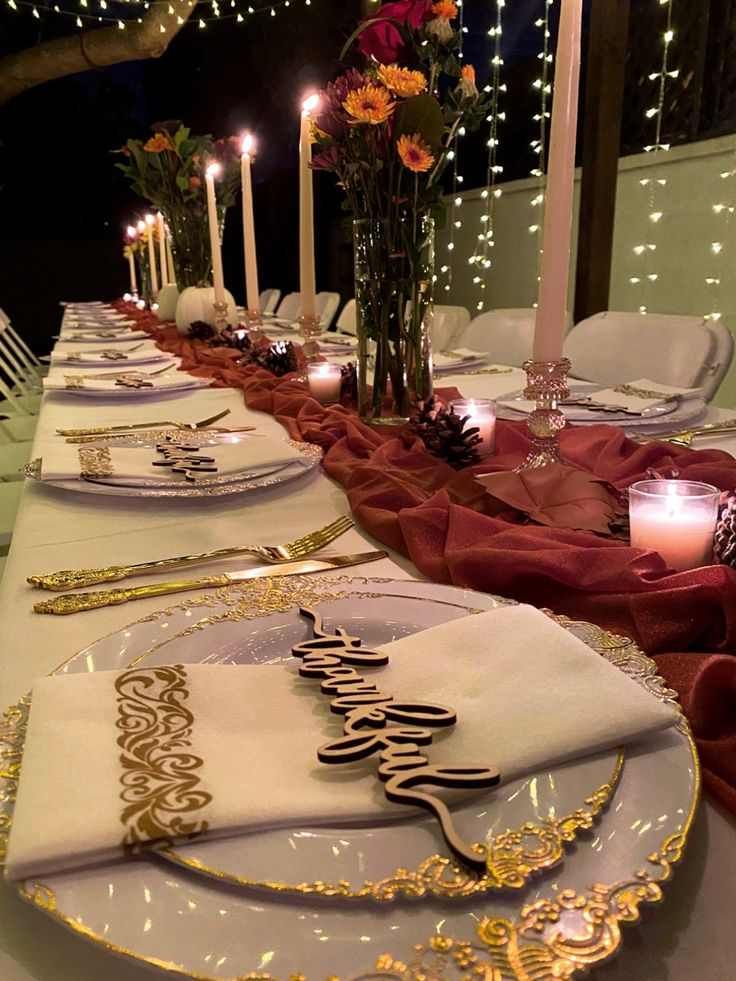Outdoor dining table set with candle clusters, wrought‑iron chairs, linen runners, soft moonlight, romantic ambiance
