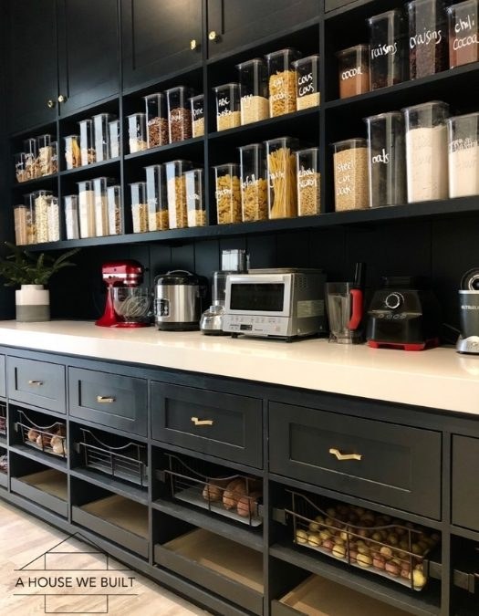 Rustic floating shelves in a pantry, ceramic jars, linen tea towels, warm ambient lighting.