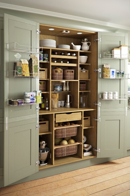 Pantry shelf dedicated to appliances, sleek white finish, organized cords, warm accent lighting.