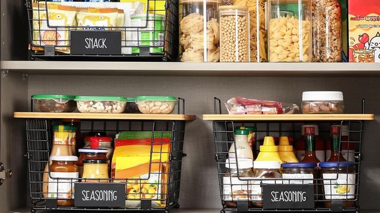 Pantry organization ideas using tiered metal can racks for perfect visibility and inventory tracking.