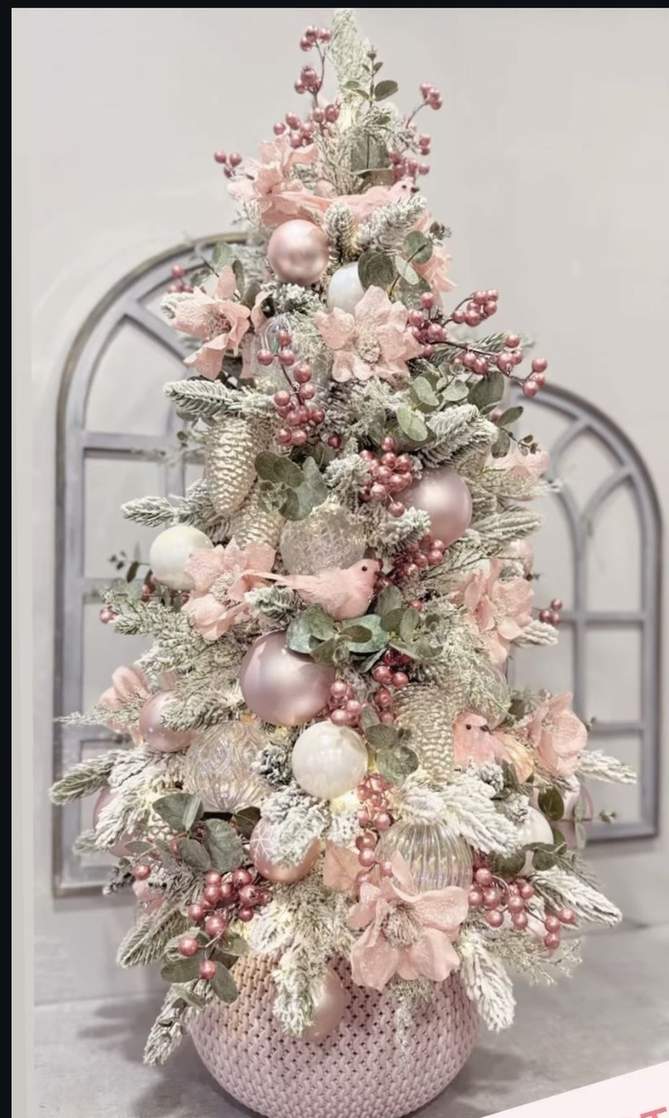 Entryway with a pink candy cane patterned rug