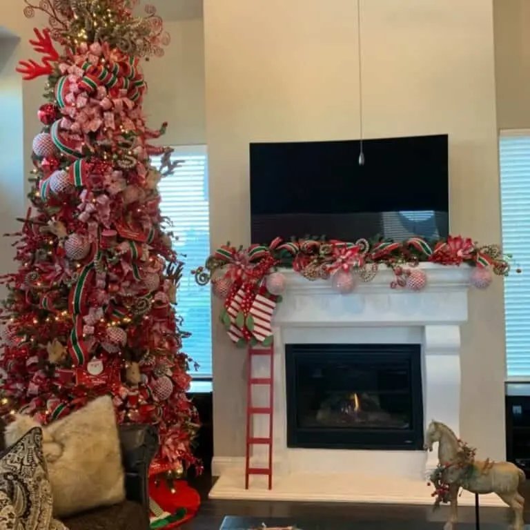 Traditional family living room tree with red satin ribbon garland, brick fireplace, soft ambient lighting