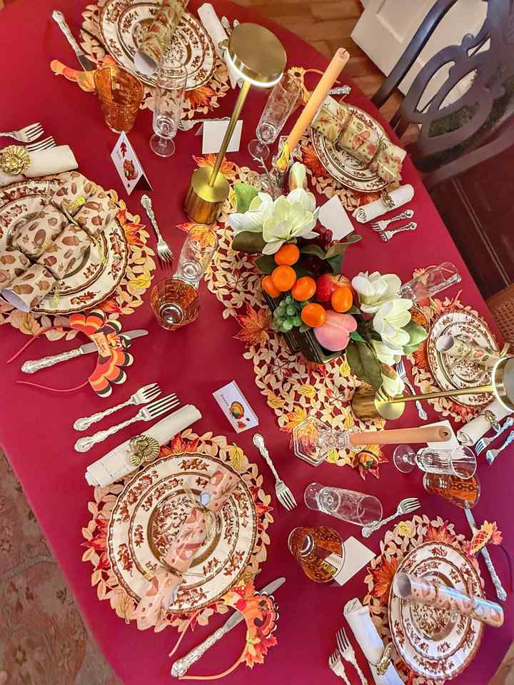 Red Tablecloth Turkey Place Cards Fruit Centerpiece