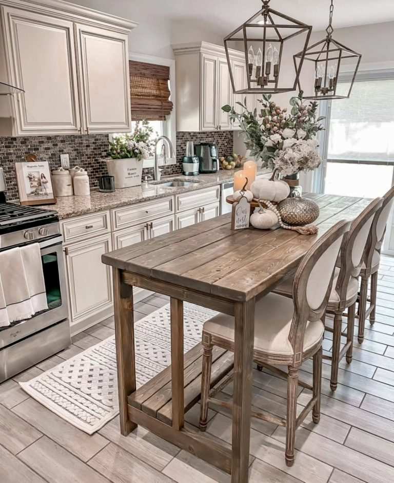 Kitchen island of reclaimed wood, farmhouse sink, pendant lights, open shelving.