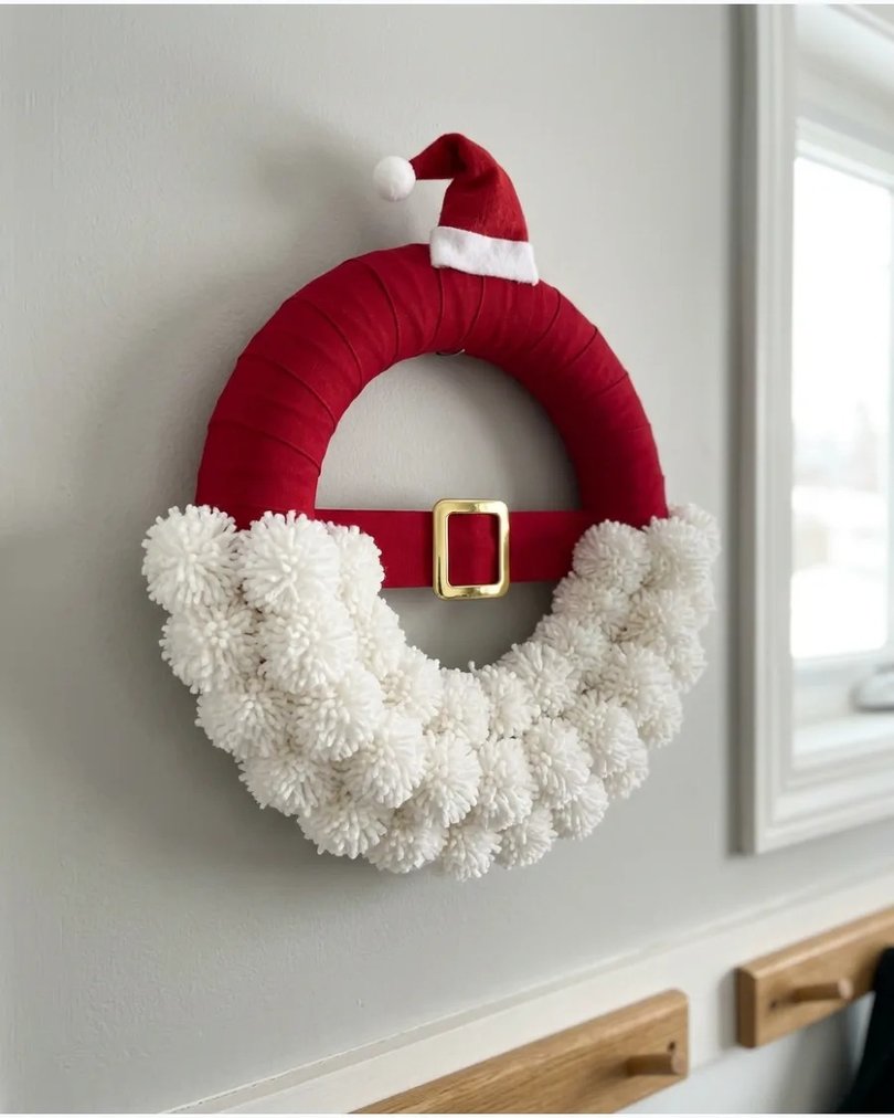 Santa wreath with smiling face on white door with lights