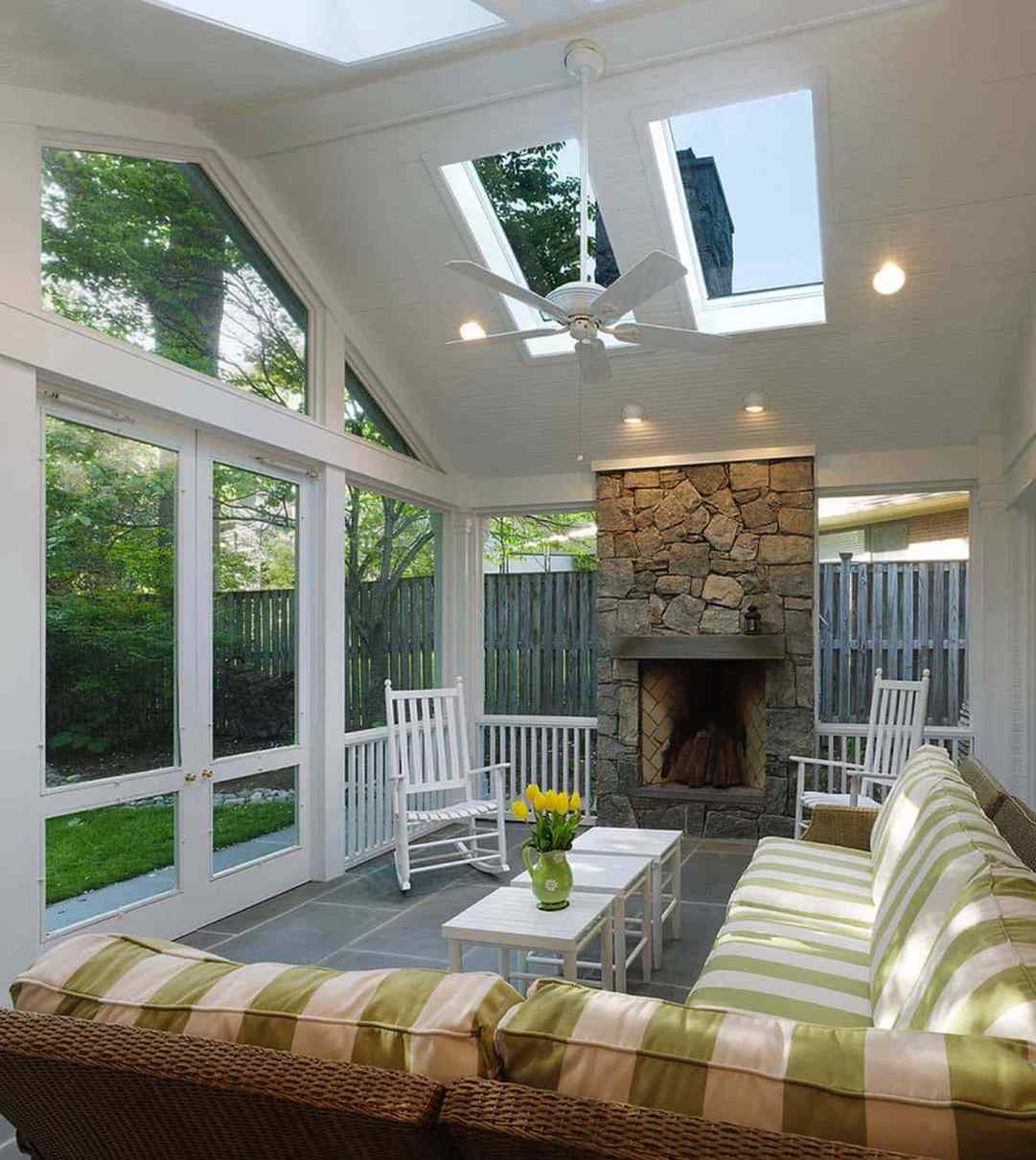 Screened in porch ideas tv fireplace setup for an ultimate outdoor living room experience.