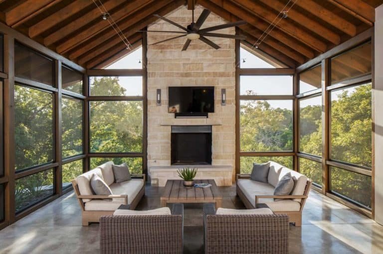Screened in porch ideas tv wicker fireplace fan combo for an organized living space.