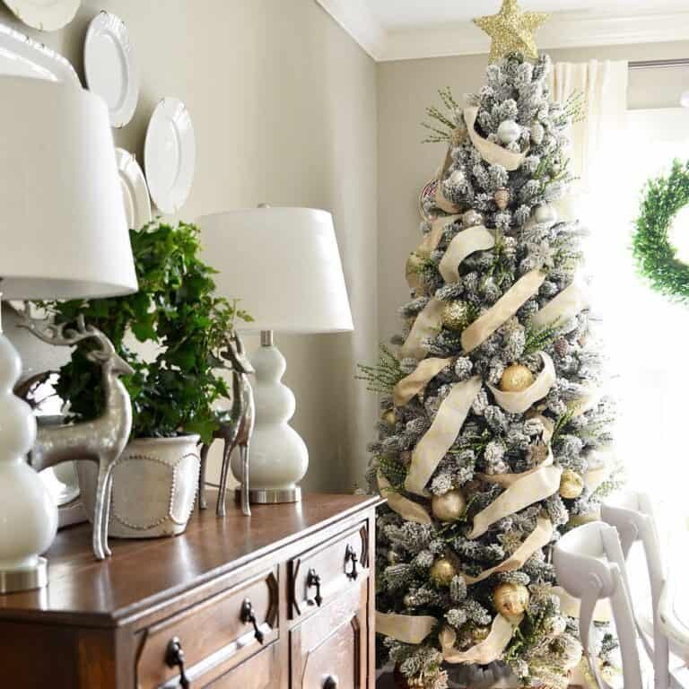 Japandi style living room with silver white ribbon tree by cane credenza in soft daylight