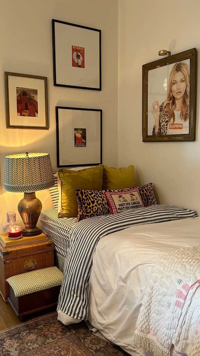 Small bedroom decor with a vintage trunk as a nightstand