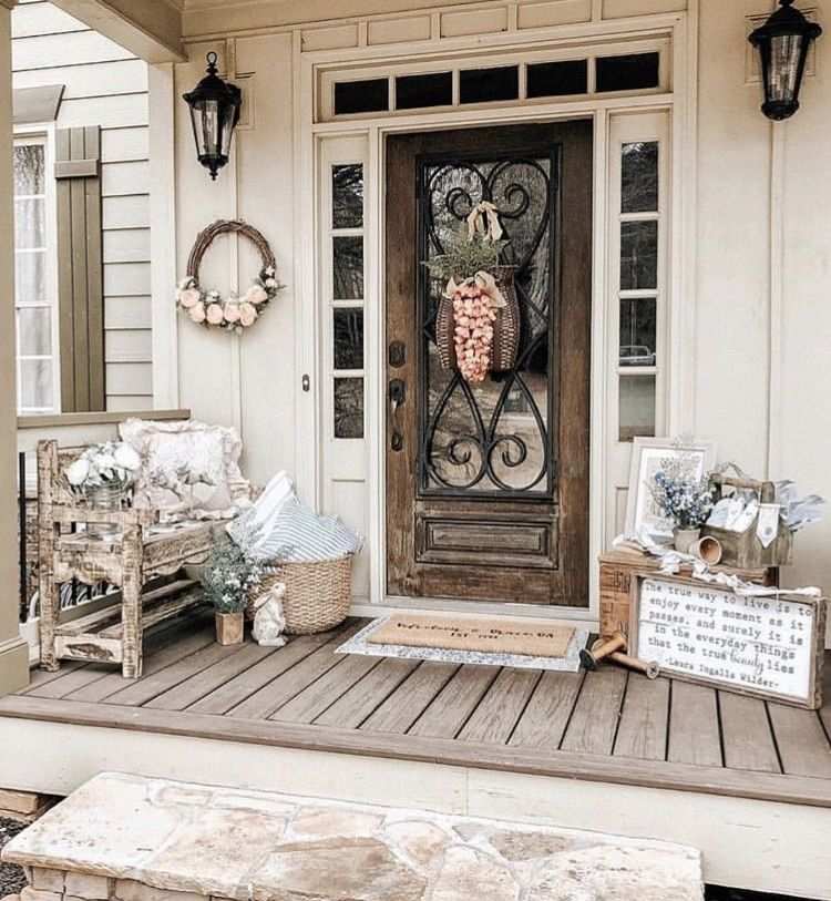 Front porch showcasing a harmonious blend of pastel furniture, greenery, and soft lighting