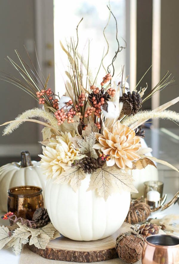 Casual dining setting with a seagrass woven basket filled with figs pears and walnuts