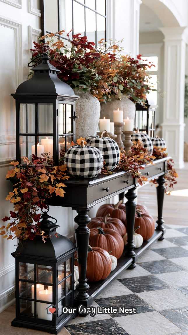 Two medium pumpkins on a reclaimed wood bench, linen runner, soft amber lanterns, dusk lighting