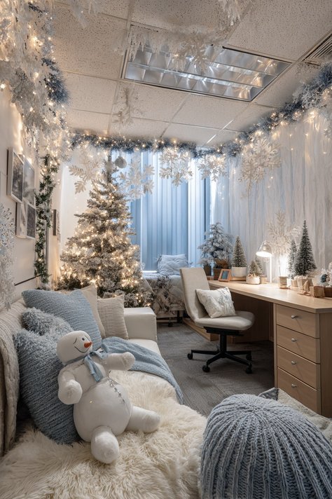 A workspace with white and silver decor, including a white tree and silver ornaments.