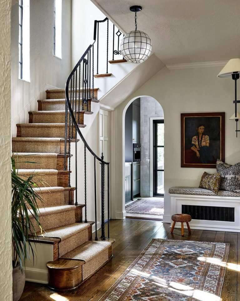 Maximalist staircase with bold patterns, vibrant colors, and mixed decor, eclectic style