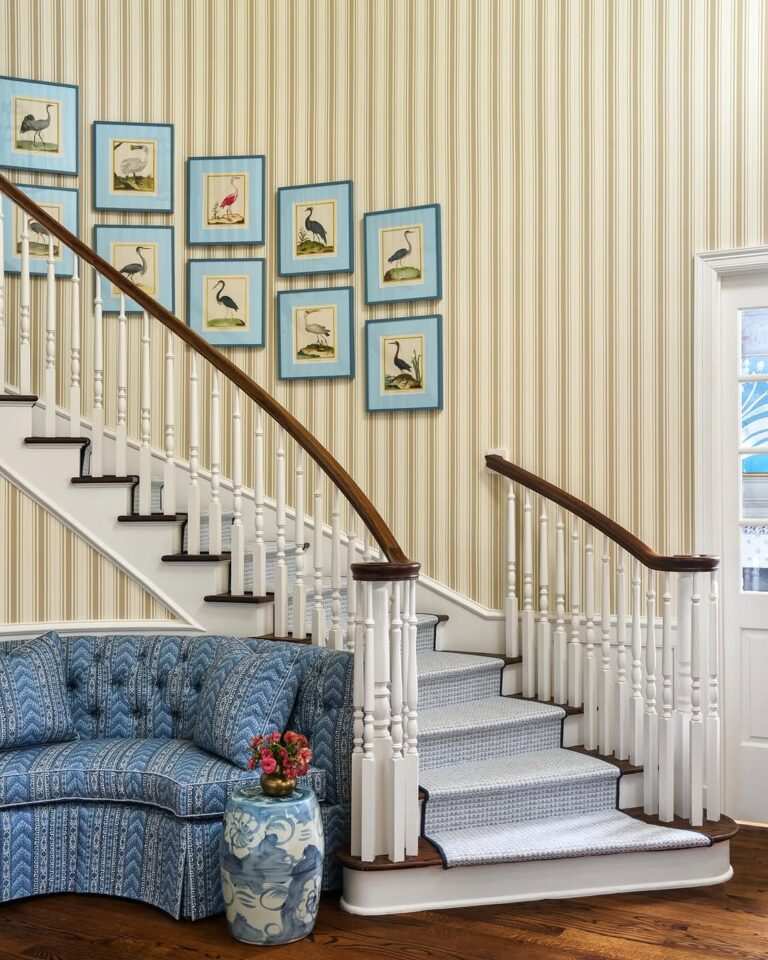 Scandinavian staircase with light wood, white walls, and cozy textiles, bright and airy